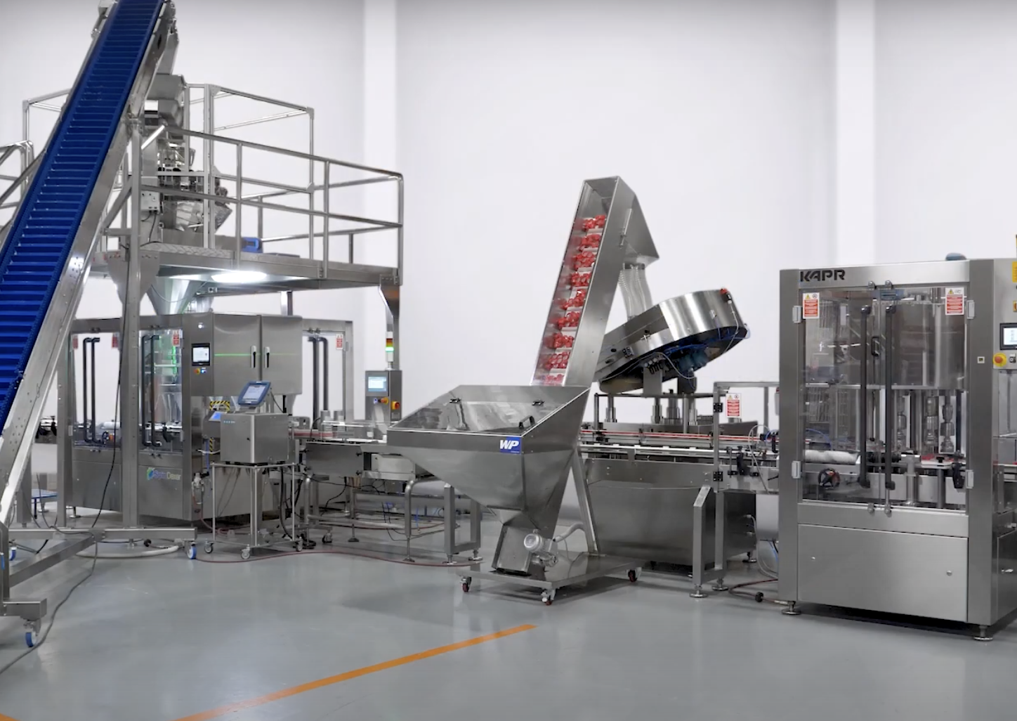 Spindexer HS rotary filler turnkey system with filler capper and labeler